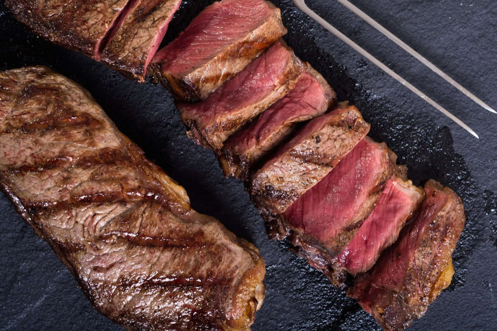 New York strip steak marinated and grilled with preserved lemon