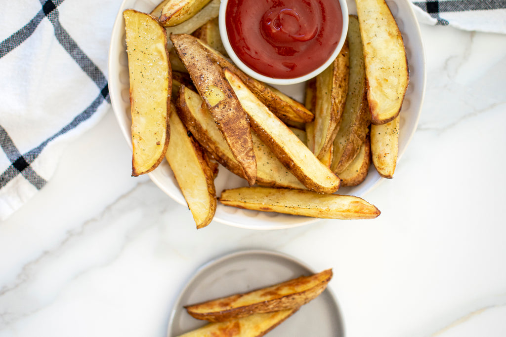 Potato wedged baked with preserved lemon and cumin garlic